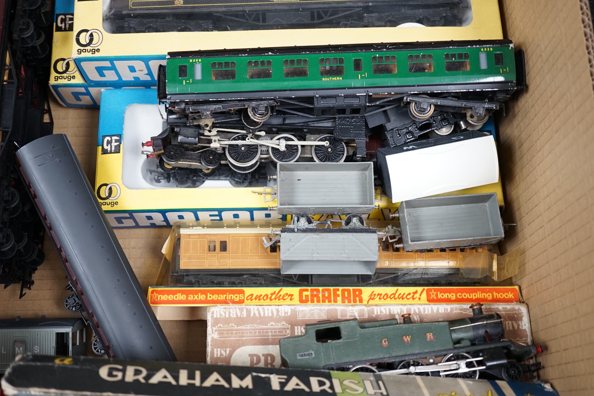 A collection of 00 gauge model Railway by Graham Farish, Exley, etc. including two locomotives; a GWR Prairie Tank loco, plus the remains of another, and a BR Class 5 4-6-0 tender loco, two boxed Pullman cars, freight wa
